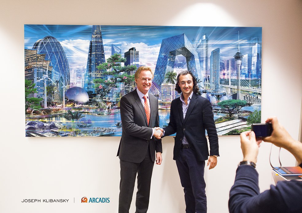 Joseph Klibansky shaking the hand of Niel McArthy (CEO Arcadis NV) - ARCADIS N.V. commisions Joseph Klibansky for 125 year anniversary