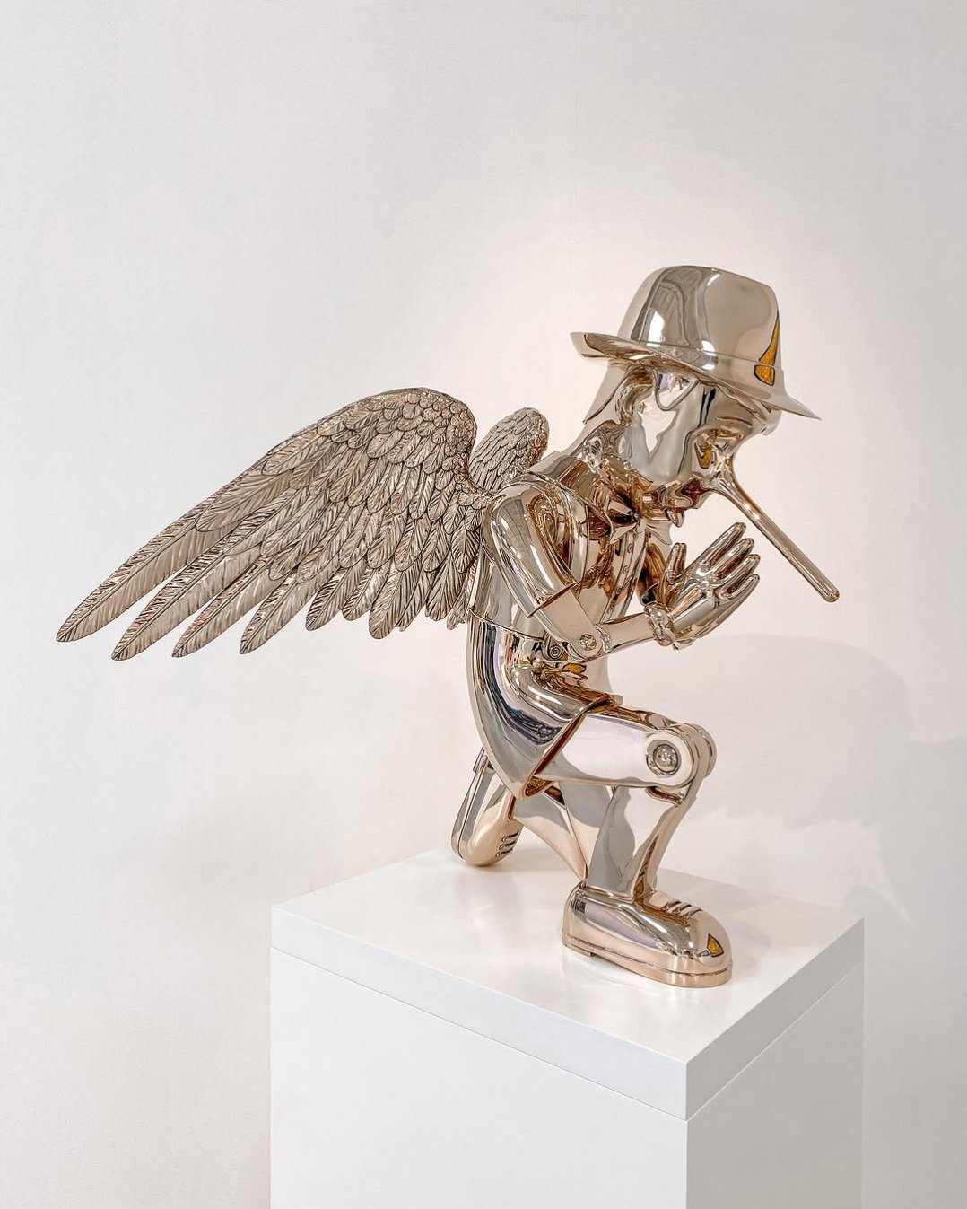 By now you have probably seen some of my IG stories during the creation process  of this sculpture.. I named it “Reflections of an Angel”  This is the 4th sculpture in my ongoing series based on the Pinocchio character. Most people think the Pinocchio character is created by Walt Disney,  but Disney was actually inspired by a 1883 Italian children's novel The Adventures of Pinocchio by Carlo Collodi.  Pinocchio, a marionette puppet , must earn the right to become a real boy by proving to be truthful, brave and selfless.  For my sculpture “Reflections of an Angel” I wanted to expand on this traditional story by adding wings to the character and posing a question to the viewer..   the question is “ if one makes a mistake or isn’t truthful, does one lose it angels wings, or the possibility to become a real boy? “  As people we want to be truthful, brave and selfless… but in the process of maturing we tend to experiment and stumble, to get back up and reset.  There are obvious boundaries in society .. but there are also areas where there is more margin to make mistakes and come back a better person.. do you still have your wings?   #contemporaryart #josephklibansky #sculpture #artoftheday #artbasel #art