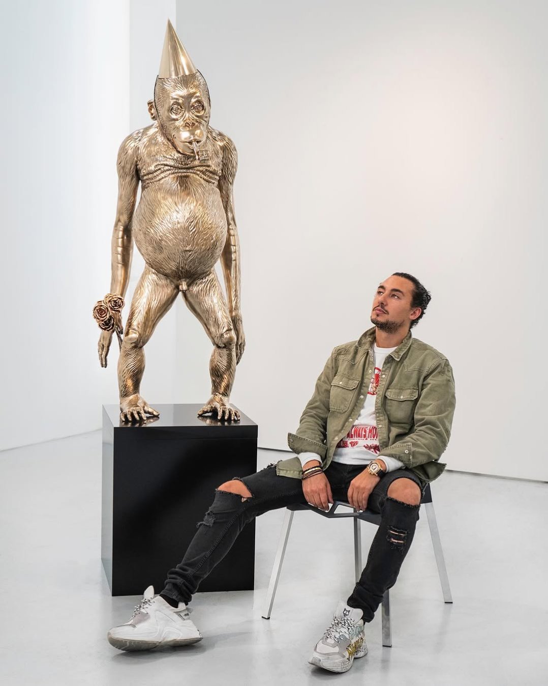 This sculpture titled “Birthday Suit” gets it’s origin from my gorilla head sculpture “Big Bang”  that piece was received so well that I wanted to experiment further with the theme of monkeys.. so I went for a full body to see if I could convey extra emotions and add humor to the sculpture by making him naked with a bunch of roses. He feels like he is late to the party.. like people can often feel when they “miss the boat” on something